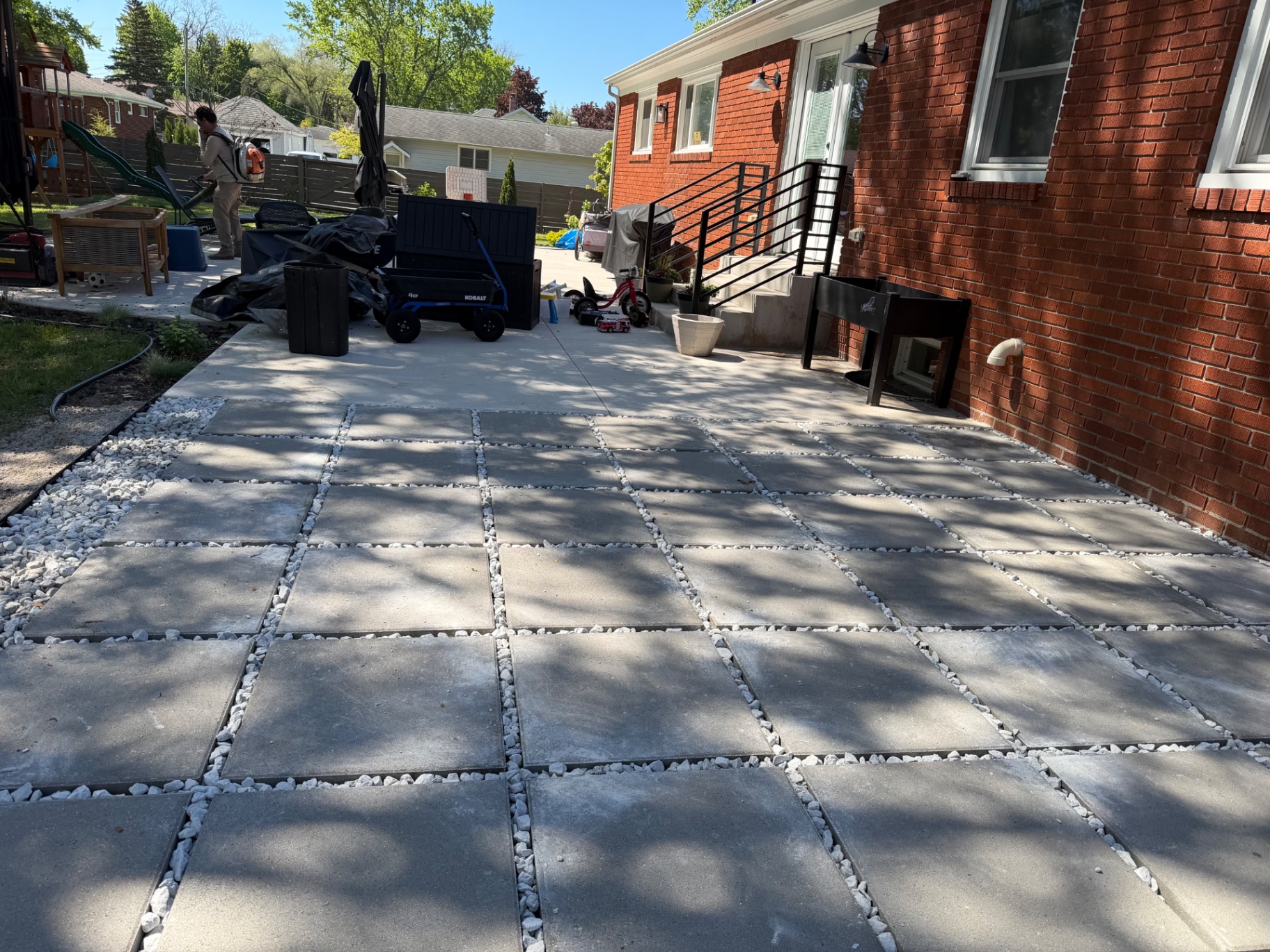 Concrete paver patio with white stone joints